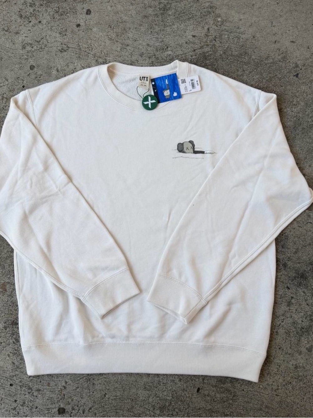 KAWS White Crewneck Sweatshirt with Small Grey Graphic